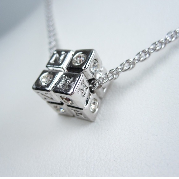 Nina Ricci Jewelry - Nina Ricci Rhodium Plated Pendant with Swarovski Crystals - 16-18"
length - 3526